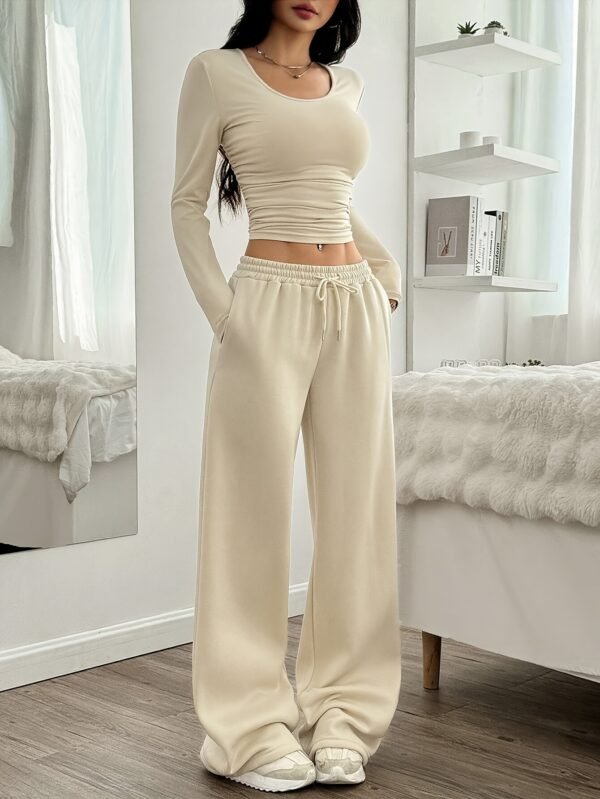 Estilo Primavera y Otoño Dos Piezas de Mujer Casual de Color Sólido Plisado Cuello Redondo Camiseta Corta y Pantalones de Cintura Ancha con Cuerda.